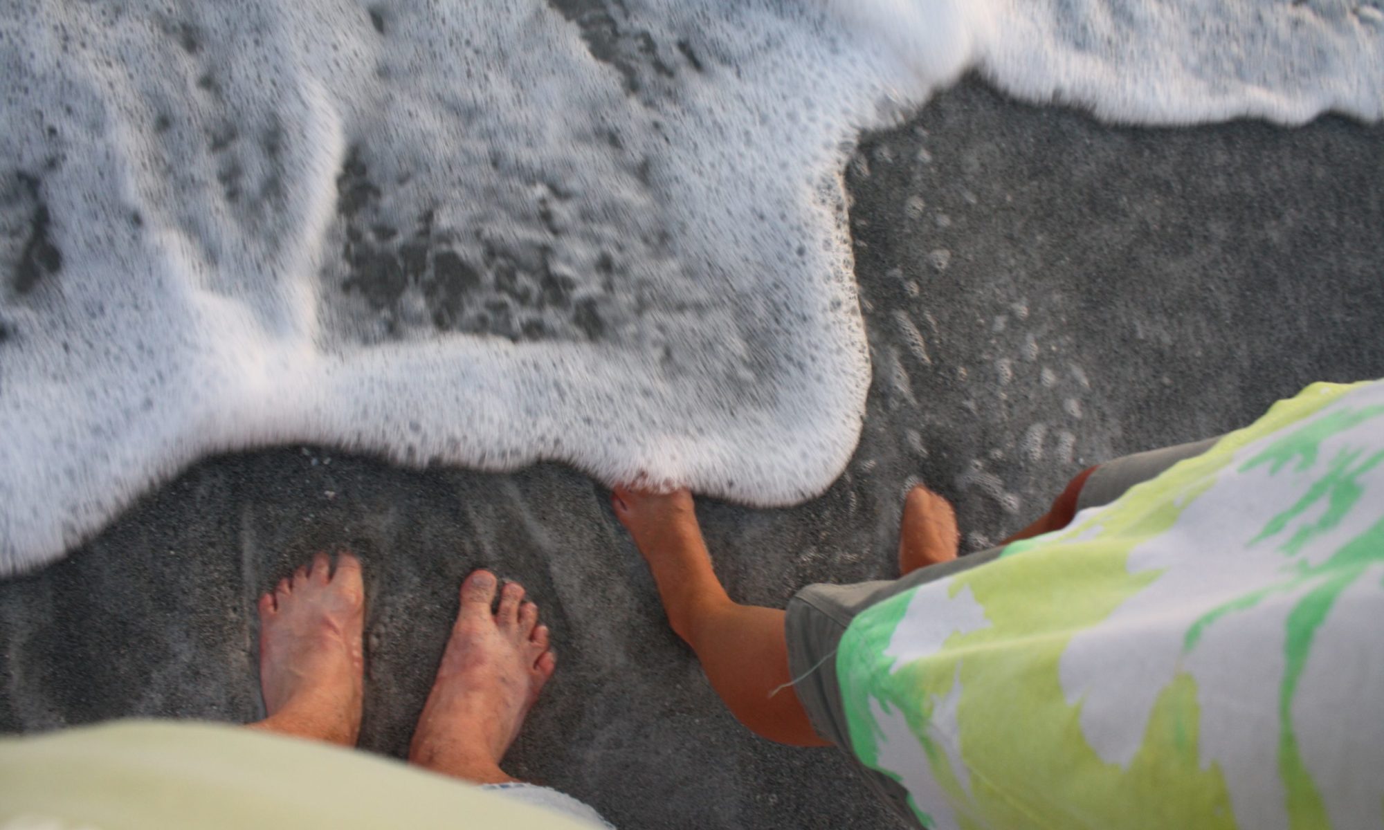 Longboat Arms feet in the surf